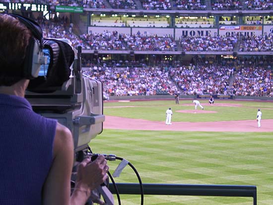 television camera following the game