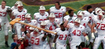 Victorious Badgers with the axe